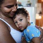 Woman holding a baby