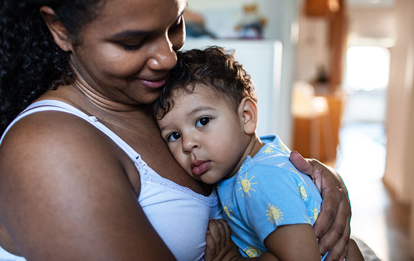 Woman holding a baby
