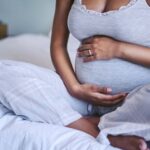Pregnant woman seated